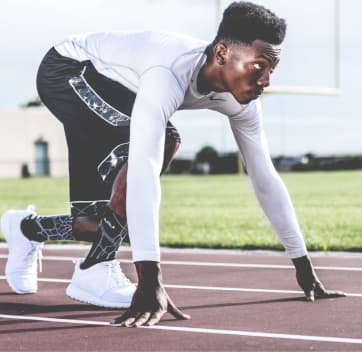 Man about to start running a race